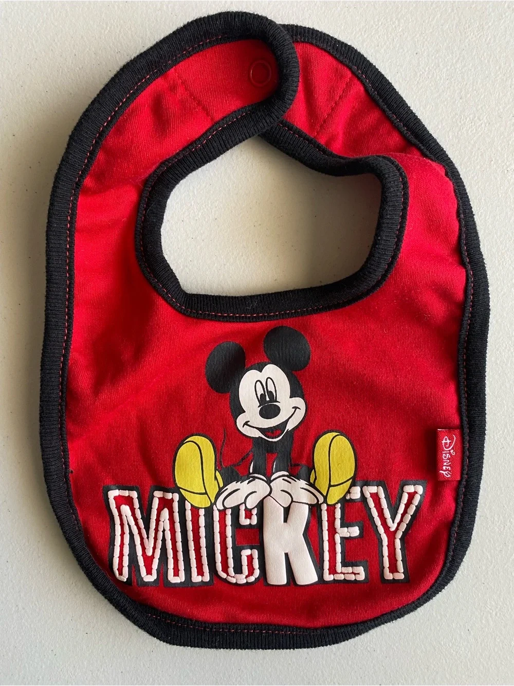 Disney Mickey Mouse Baby Bib Red Black Textured Logo Graphic
